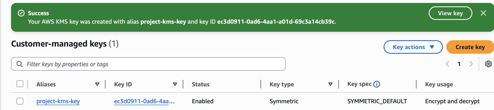 Stage 01 — the customer-managed symmetric key project-kms-key created and enabled for encrypt and decrypt.